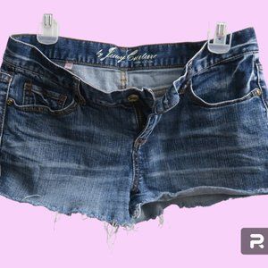 Juicy Couture denim jeans raw edge short shorts cut off in blue size 26.